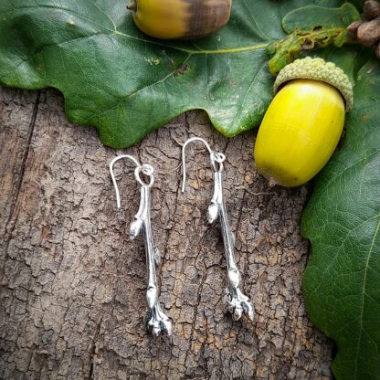 Oak-twig-earrings-natural-background