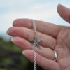 medium-starfish-necklace-in-hand