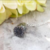 Sterling silver flanders poppy head pendant with silver belcher chain , with flower in background 3