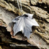 Maple-leaf-on-bark-background2